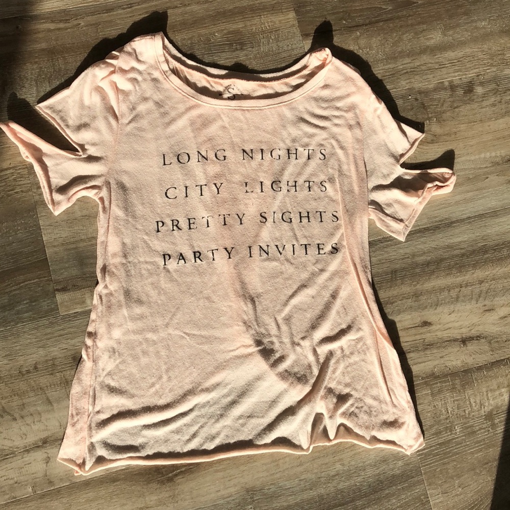 Shirt with cutout sleeve detail